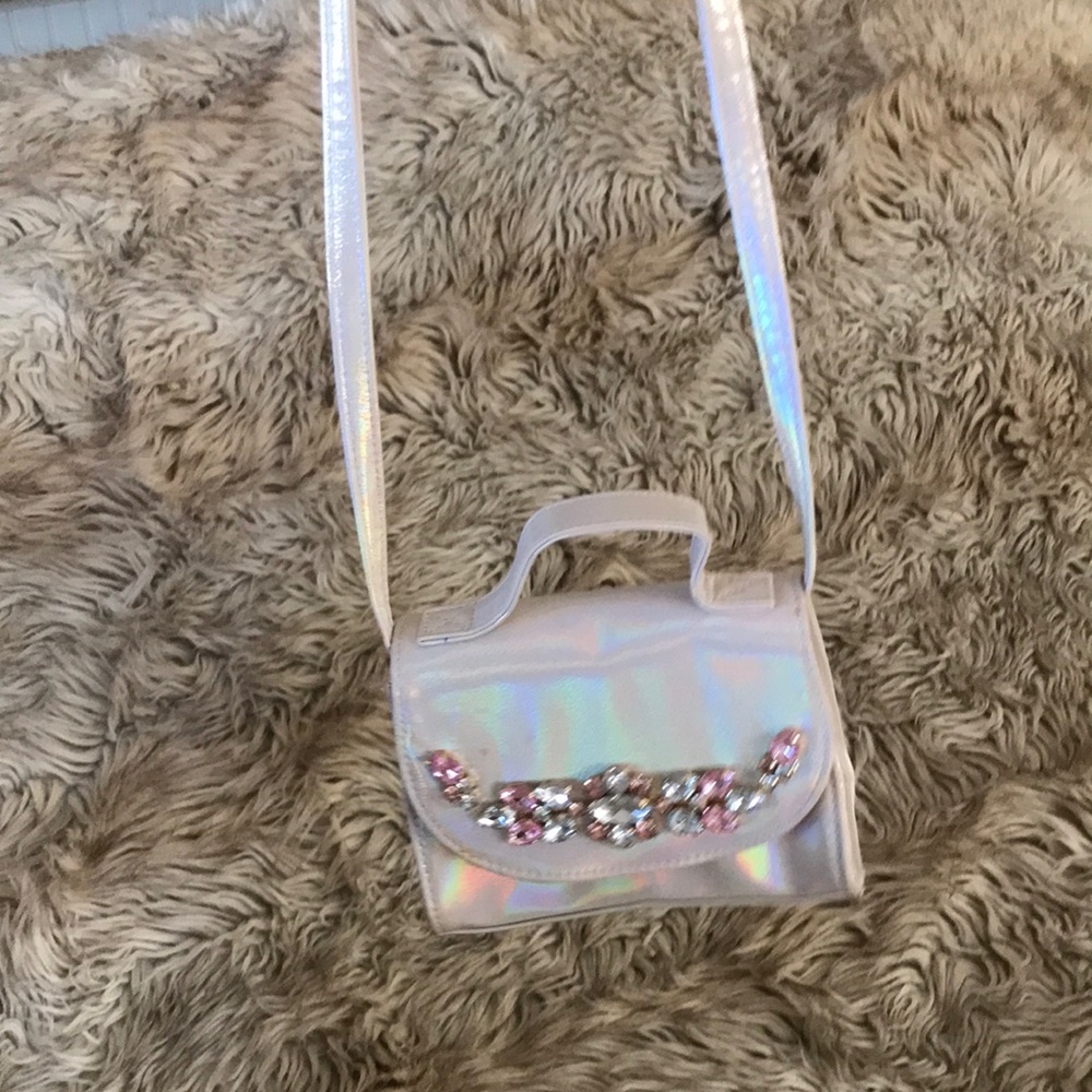 Place iridescent pink purse jeweled